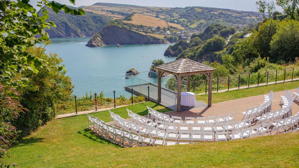 Outdoor wedding seating area overlooking the bay at The Venue, Sandy Cove Hotel