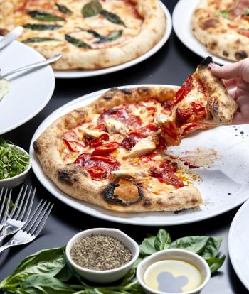 Pizza and Salads served at the restaurants at Sandy Cove Hotel