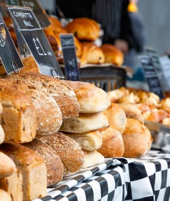 Pannier Market stall with freshly baked bread on sale