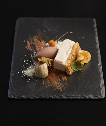 A banoffee pie dessert served on a slate at Sandy Cove Hotel