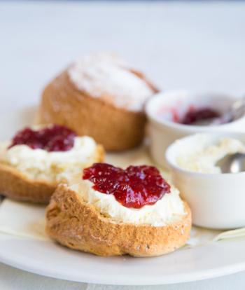 A plate of scones with jam and cream served at the Sandy Cove Hotel