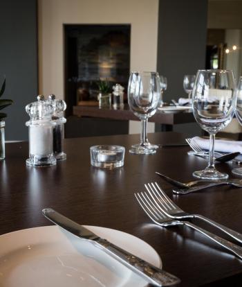 A table setting in the Cove Restaurant at The Sandy Cove Hotel