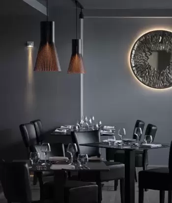 Tables and decor inside the Seacliff Restaurant at Sandy Cove Hotel