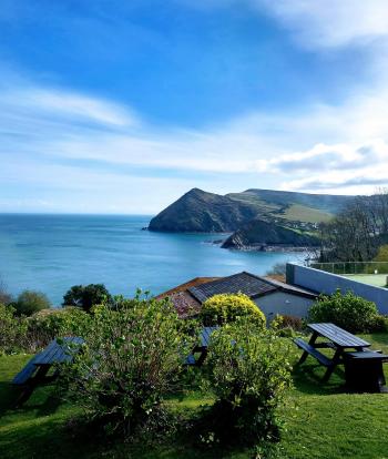 A view over the sea from Sandy Cove Hotel's outdoor terrace