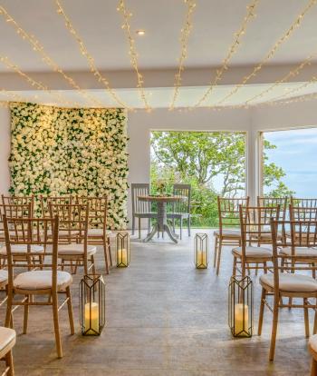 Chairs lining the Seascape Ceremony Room at The Venue, Sandy Cove