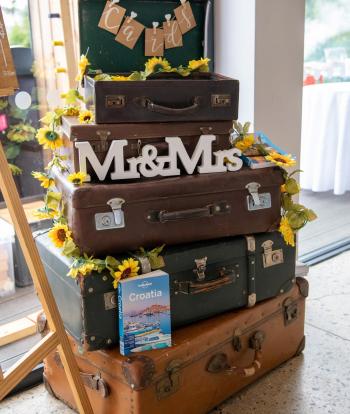 Suitcase decorations for a wedding at The Venue, Sandy Cove Hotel