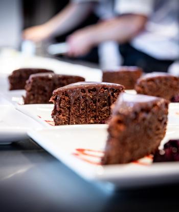 Slices of cake being prepared in The Venue's kitchen