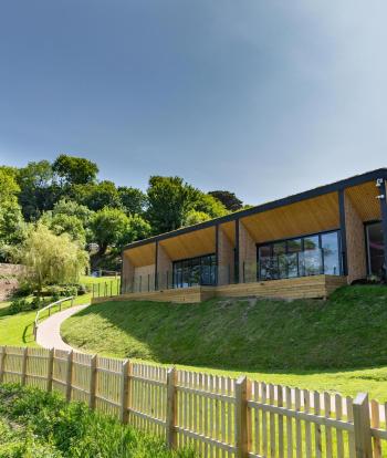 An external view of The Venue at Sandy Cove Hotel on a sunny Day