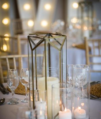 Candles and decorations inside the Venue at Sandy Cove Hotel