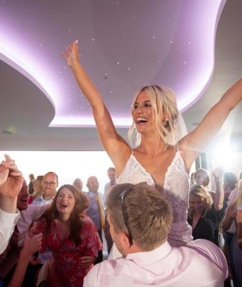 Bride dancing with her guests