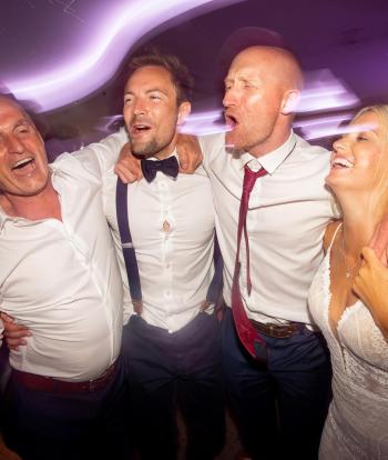 Bride dancing with her guests