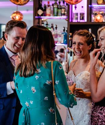 Guests laughing at the sandy cove hotel