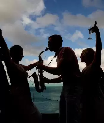 A band playing outside The Venue at Sandy Cove Hotel