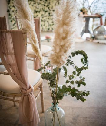 Wedding ceremony decorations inside at The Venue in Sandy Cove Hotel