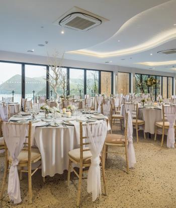 Wedding table set up at the Sandy Cove Hotel with the view behind