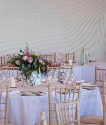 Wedding table decorations with flowers and candles