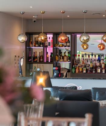 The bar area inside the Venue at the Sandy Cove Hotel