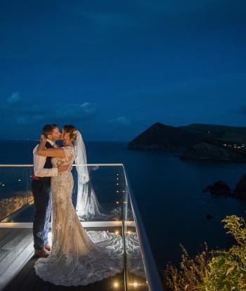 Night shot of Bride & Groom on Skywalk Platform