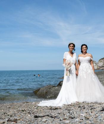 Two Brides on the Beach