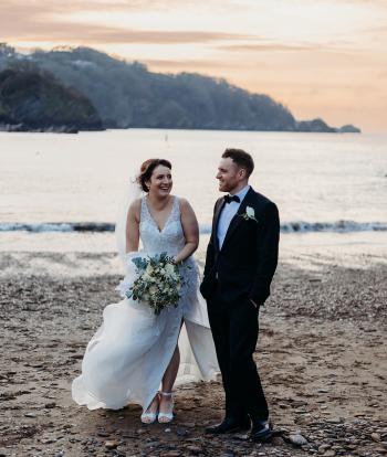 Bride & Groom on the beach at sunset