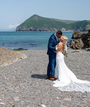 Bride & Groom on the Beach with Hangman in the background