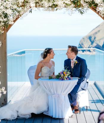 Bride & Groom under the gazebo at their ceremony 