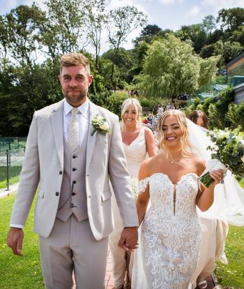 Brides & Groom After Ceremony Outside