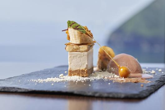 A dessert at one of Sandy Cove Hotel's restaurants with a view of the bay