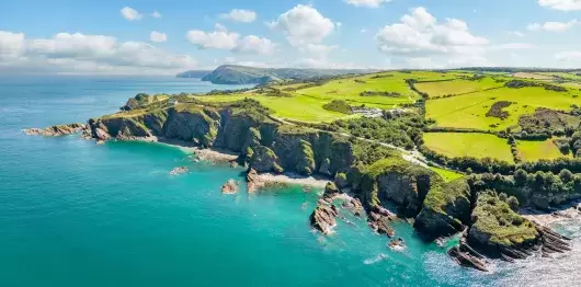 A bright, summery day at Hele Bay near Ilfracombe on the North Devon coast