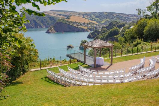 Outdoor wedding seating area overlooking the bay at The Venue, Sandy Cove Hotel