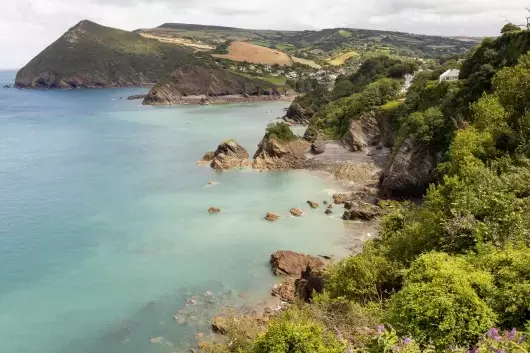 A view over the bay and Hangmans Hill seen from The Venue at Sandy Cove Hotel